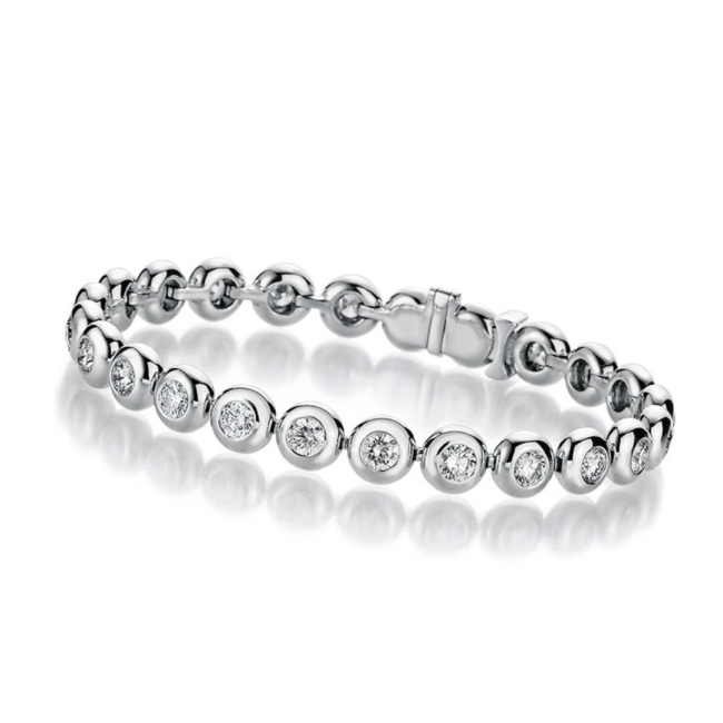Tennisarmband.zargenfassung.Diamanten.WG.JuwelierRothUlm.HeinrichLausch